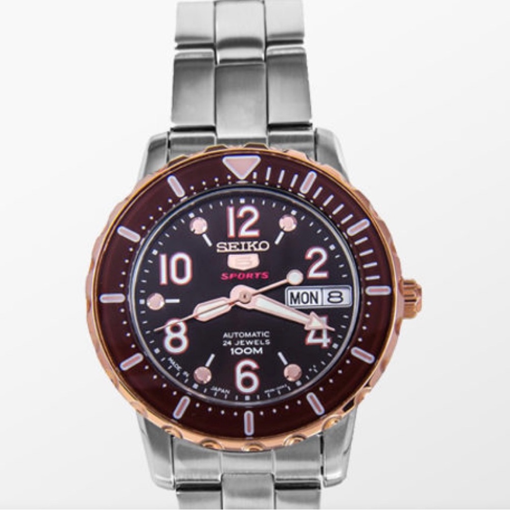 Stainless Steele Seiko Sports Automatic Watch with brown and Rose Gold Accents.